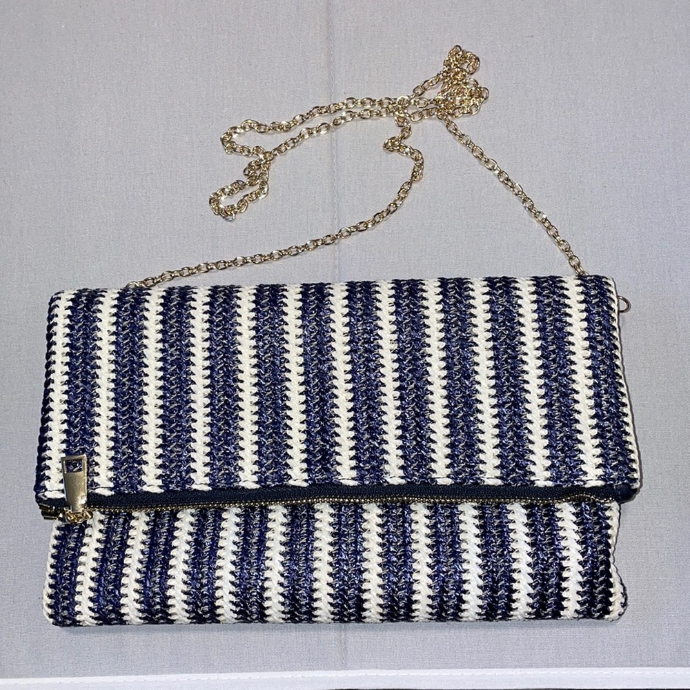 Francesca’s fold over straw envelope clutch